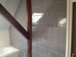 Renovatie badkamerwand zorgboerderij tegelwerk